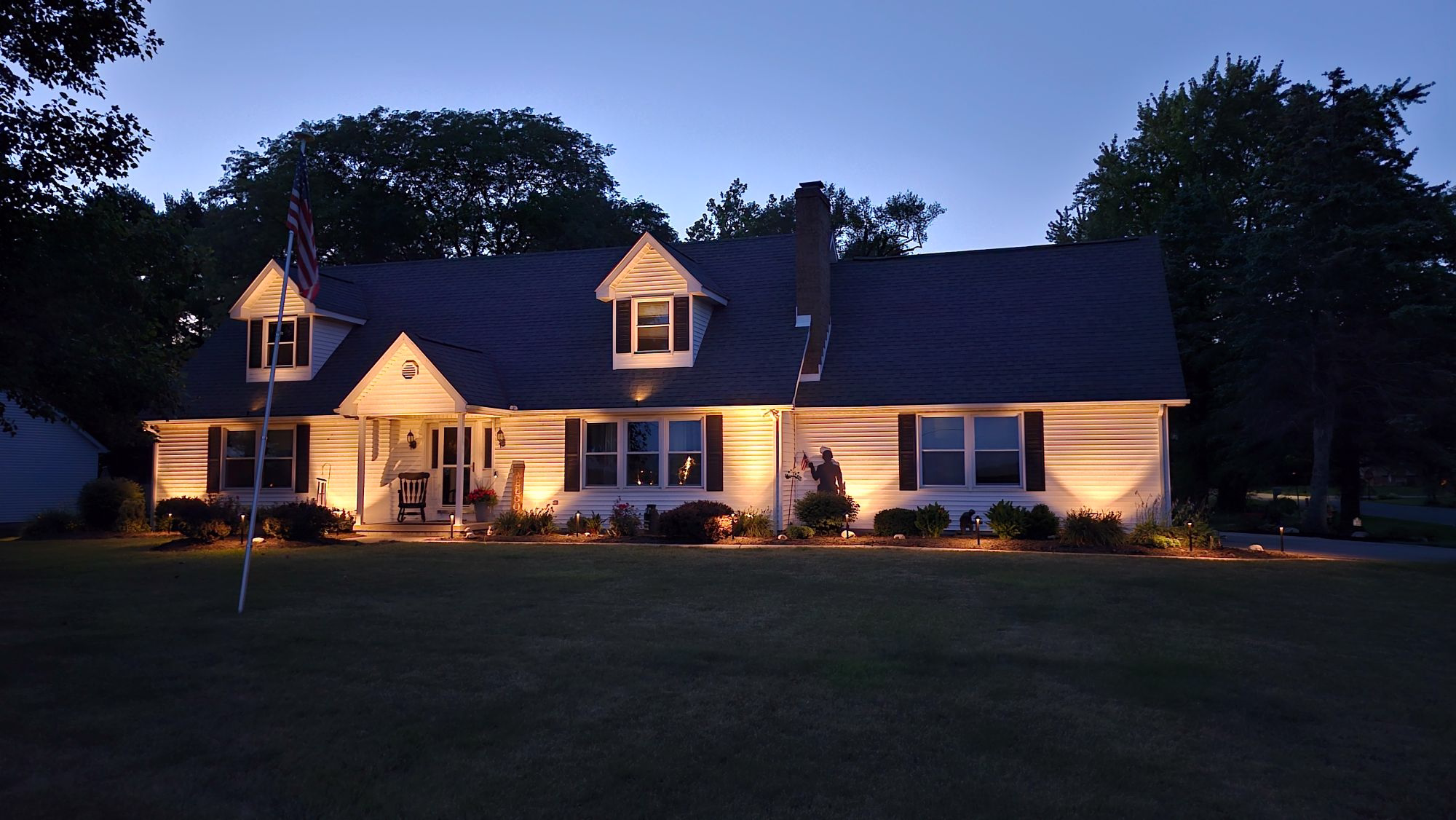 Dusk landscape lighting project in Northwest Ohio by Light Up Lima